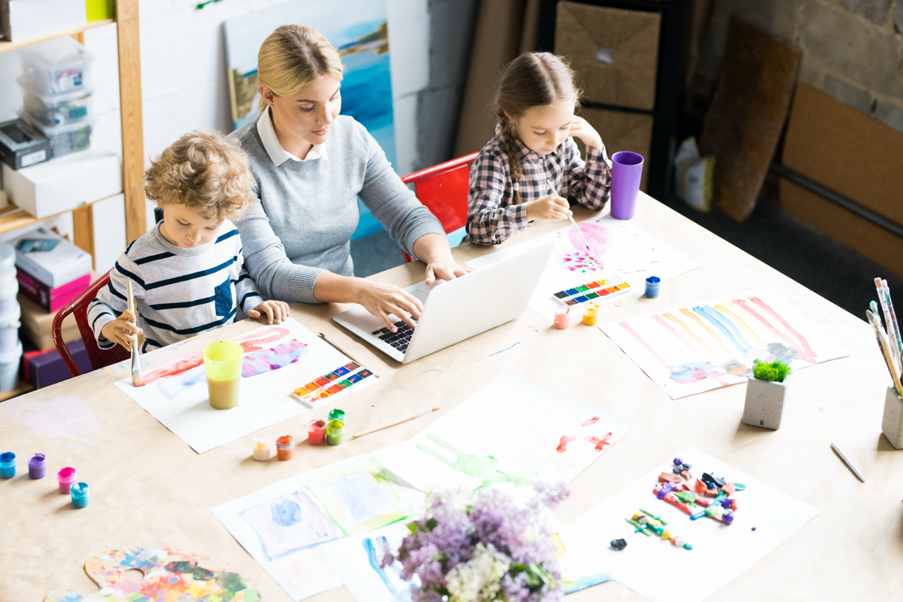 Mother at home with her two young children, McKinney custody client